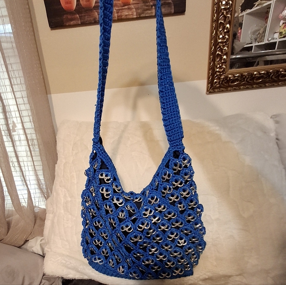 Pop top crocheted blue zip top hobo crossbody bag